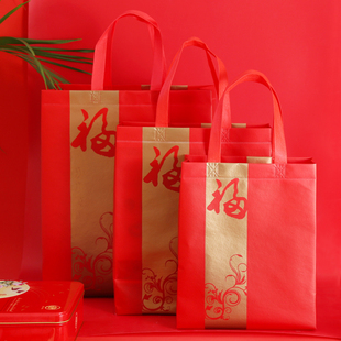 红色环保无纺布春节送礼手提袋新年年货糖，果茶烟酒包装袋子