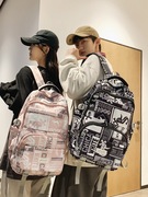 大容量韩版中学生初中生背包男时尚潮流涂鸦书包女结实双肩包