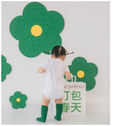 儿童摄影百天周岁宝宝拍照道具绿色花朵背景装饰摆件白色连体哈衣