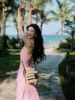 三亚海边度假沙滩裙女粉色高级感挂脖露背吊带连衣裙超仙显瘦长裙
