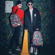 印花双肩包女韩版潮学院风帆布书包中学生男大容量旅行包电脑背包