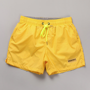 亮黄色短裤男宽松休闲三分裤日常外穿跑步健身运动裤海边穿沙滩裤