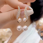 高级感金色两颗珍珠镶钻耳环2023年S925纯银针小众气质耳饰女