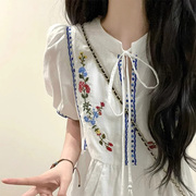 白色刺绣泡泡短袖连衣裙女2024夏季民族，度假风设计感气质公主长裙