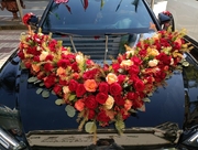 99红玫瑰花束云南昆明会展中心万达鲜花速递同城玫瑰花婚车装饰