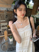 纯欲小清新白色蕾丝吊带裙法式高级感连衣裙2024夏日海边度假仙女