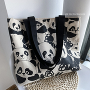 原创设计熊猫大容量单肩帆布包包女学生通勤手提书包袋2023年