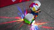 儿童特技三轮车 吊车头360度旋转音乐灯光电动玩具