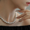 s925银真多麻灰色施家珍珠，项链女时尚轻奢高级感设计2024饰品
