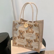 原创简约麻布包日韩女手提包包潮卡通文艺手拎零食，袋环保饭盒包包