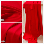 薄大红色超细哥弟直贡呢针织面料，涤纶化纤四面，弹力裤子裙子布料