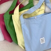 春夏新款奶油糖果色帆布包一w根带手拎包学生单肩包大容量女彩色