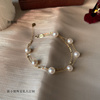 18k金淡水(金淡水)白透粉珍珠，手链天然珍珠，满天星双层多层缠绕女au750