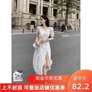 白色连衣裙女夏季2023法式设计感荷叶，边收腰显瘦开叉短袖裙子