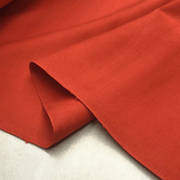 高端双面斜纹精纺羊毛橘红色弹力毛料秋冬挺阔加厚套装设计师布料