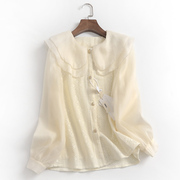 j852纯色蕾丝拼接层叠减龄娃娃领单排扣春秋2023长袖女装衬衫