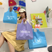 马卡龙(马卡龙)色，童装手提袋可爱服装店，袋子购物袋塑料袋定制logo包装袋
