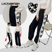 lacrawfish时尚复古运动风，爱心腰果花印花束脚休闲卫裤女裤子