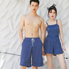 韩国蜜月旅行情侣泳衣海边度假情侣款蓝色条纹，保守女连体泳装沙滩