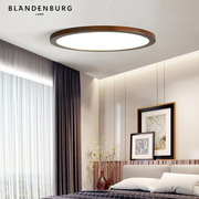 圆形吸顶灯北欧创意设计师胡桃木房间灯简约现代家用几何卧室主灯