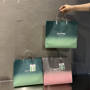 渐变绿色粉色灰色免税店，手提袋塑料复合服装店，袋子购物袋袋