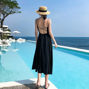 海边度假风女装性感露背吊带长裙，交叉细肩带，沙滩裙夏季高腰小黑裙