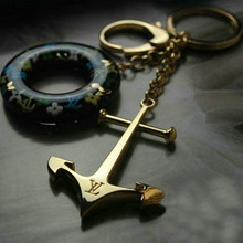 Hermosa cadena clave decorada con el don de la industria eólica cumpleaños Corsair buen embalaje bolso a juego hebilla
