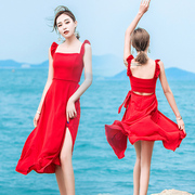 大红色连衣裙女夏2023性感露腰背带，开叉木耳边吊带沙滩裙长裙